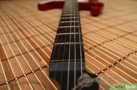 Image titled Make an Electric Guitar Into a Lap Steel Guitar Step 1