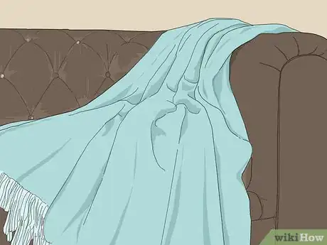 Image titled Decorate a Leather Couch Step 3