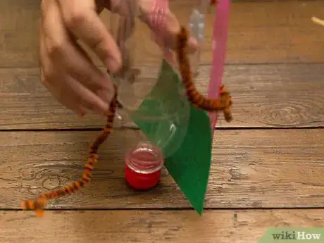 Image titled Make a Puppet with an Empty Bottle and a Broom Stick Step 10