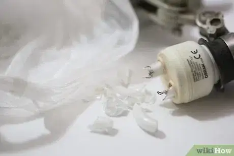 Image titled Remove a Broken Light Bulb with a Potato Step 1