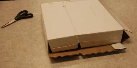 Image titled Fold like a taco, and tape securely.