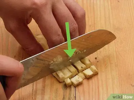 Image titled Cut Sweet Potatoes Step 5