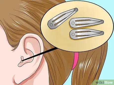 Image titled Get Something out of Your Ear Step 1