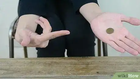 Image titled Do a Simple Coin Magic Trick Step 6