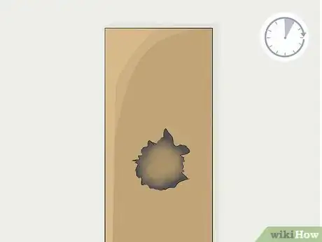 Image titled Paint Fake Knots in Wood Step 3