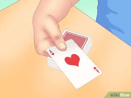 Image titled Make a Card Fall Through a Table Step 10