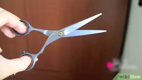 Image titled Cut Side Swept Bangs Step 4