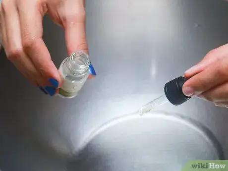 Image titled Apply Castor Oil for Hair Step 3