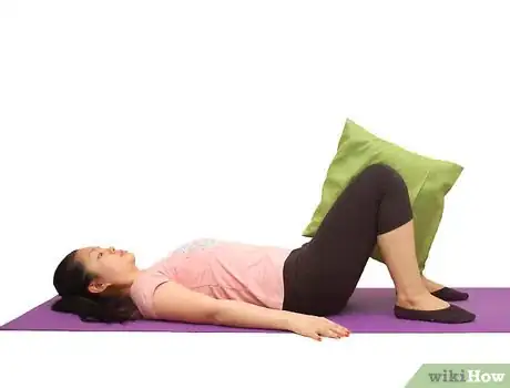 Image titled Perform the Pillow Squeeze (Pilates) Step 1