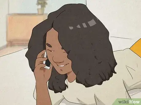 Image titled Flirt over the Phone Step 1