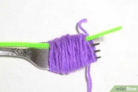 Image titled Make Yarn Tassel Flowers Step 3