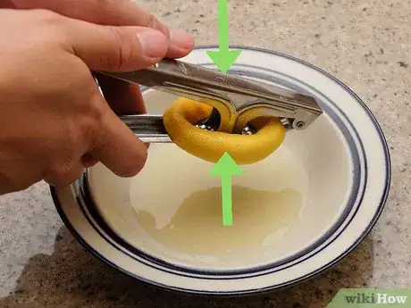 Image titled Use a Citrus Squeezer Step 7