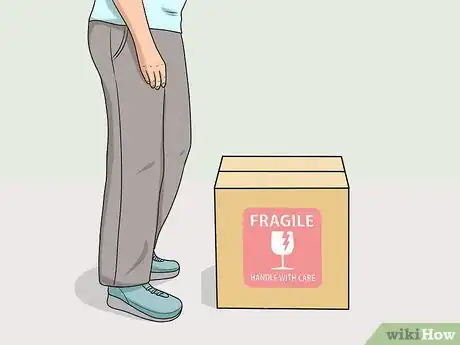 Image titled Protect Your Back While Moving Step 2