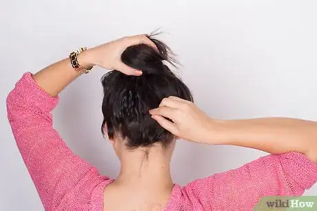 Image titled Put Frizzy Hair Into a Bun Step 8