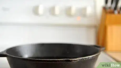 Image titled Flip an Egg Without Using a Spatula Step 1