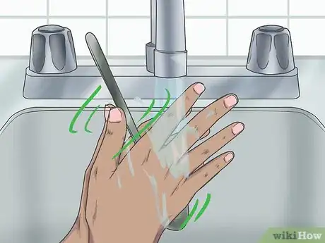Image titled Remove Garlic Smell from Your Hands Step 1