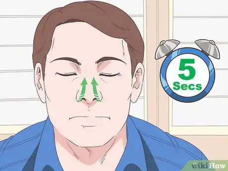 Image titled Do the Stomach Vacuum Exercise Step 2