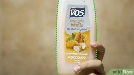 Image titled Style Poofy Hair Step 4