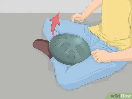 Image titled Play a Hue Drum Step 4