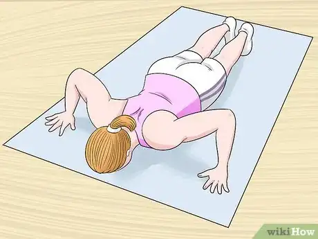 Image titled Fix Rounded Shoulders Step 2