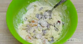 Stop Dried Fruit and Nuts from Falling to the Bottom of Cakes