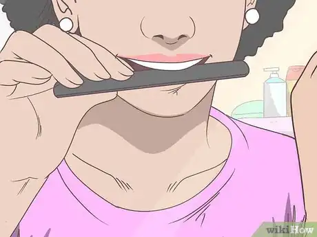Image titled File Down a Sharp Tooth Step 2