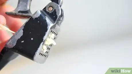 Image titled Easily Clean a Garlic Press Step 4