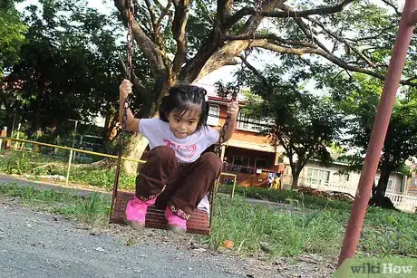 Image titled Jump off a Swing Safely Step 7