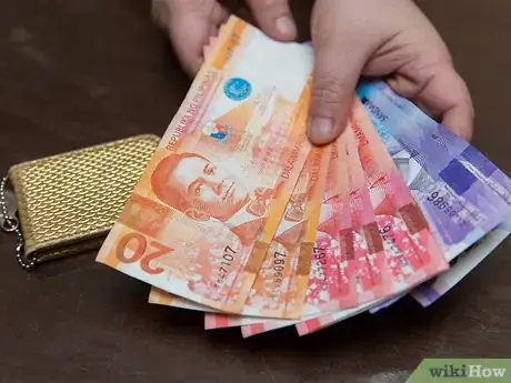 Image titled Fold Money for a Money Clip Step 4