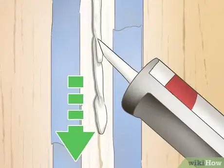 Image titled Caulk Walls Step 8