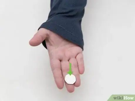 Image titled Make a Coin Disappear Step 14