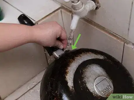 Image titled Clean Rust and Stains from a Tin Step 15