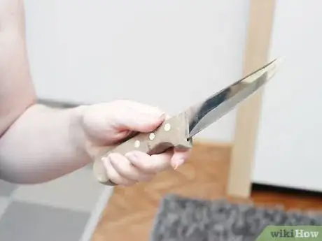 Image titled Prepare to Defend Yourself when You're Home Alone Step 1