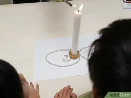 Image titled Light a Candle Without Touching the Wick Step 9