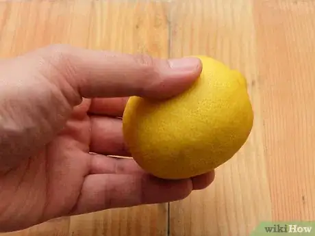 Image titled Use a Citrus Squeezer Step 1