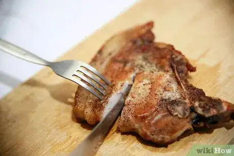 Image titled Tell if Pork Chops Are Done Step 4
