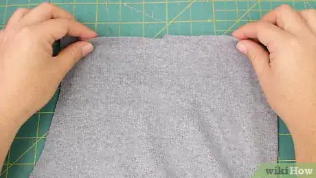Image titled Make Sweatshirt Thumb Holes Step 1
