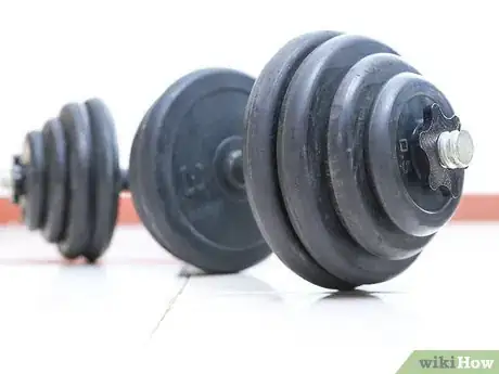 Image titled Do Shoulder Shrugs Step 1