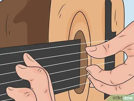 Image titled Reduce Tension when Playing Guitar Step 11