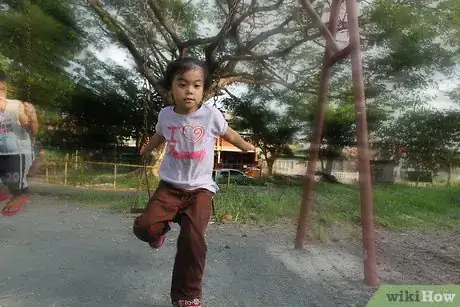 Image titled Jump off a Swing Safely Step 6