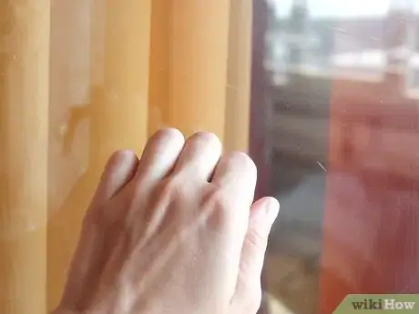 Image titled Sneak Into Your Partner's House Step 3