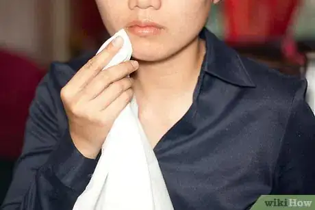 Image titled Use a Napkin with Proper Table Etiquette Step 2