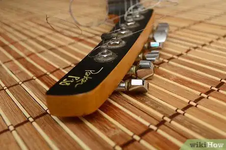 Image titled Make an Electric Guitar Into a Lap Steel Guitar Step 5