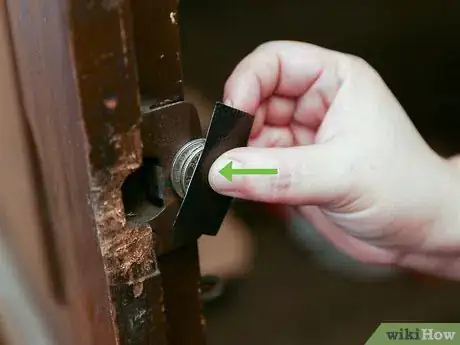 Image titled Hold a Door Open with a Coin Step 8