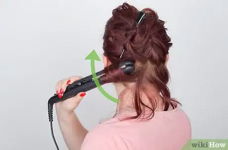 Image titled Do Curls with a Flat Iron Step 4