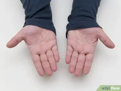 Image titled Make a Coin Disappear Step 19