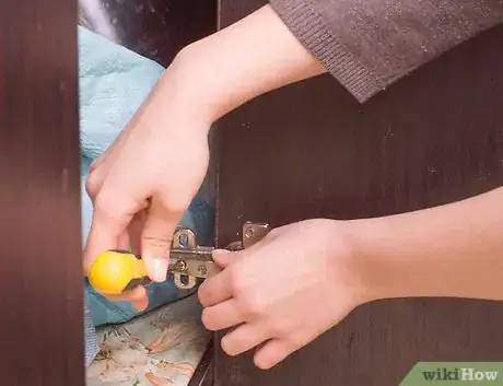 Image titled Paint Cabinet Hinges Step 7