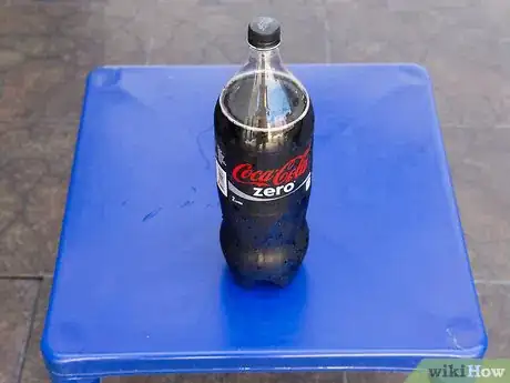 Image titled Make a Volcano out of Mentos and Soda Step 12