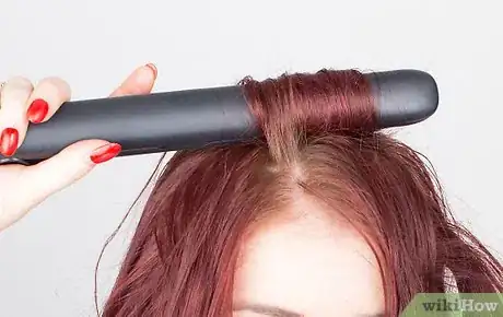 Image titled Do Curls with a Flat Iron Step 8
