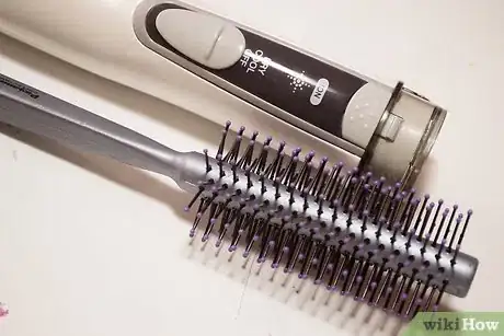 Image titled Straighten Hair with a Roller Brush Step 7